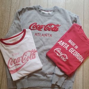 3 Coca-Cola shirts